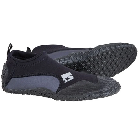 A black and grey slip on neoprene shoe showing a grippy sole and silver logo.