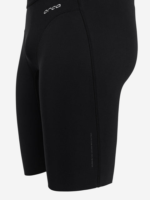 Black wetsuit shorts with 'Orca' branding on a white background