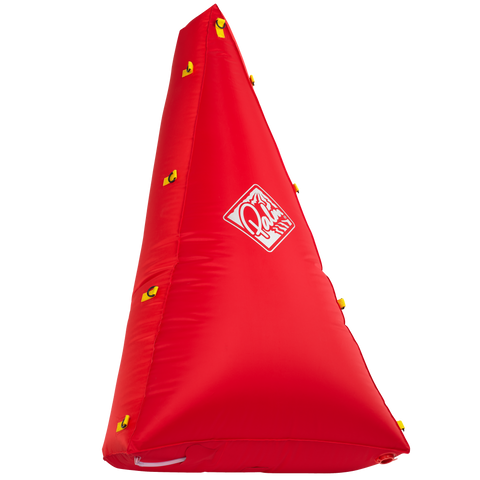 A inflated triangle shaped red canoe air bag with attachment points around the edge and a Palm logo on top.