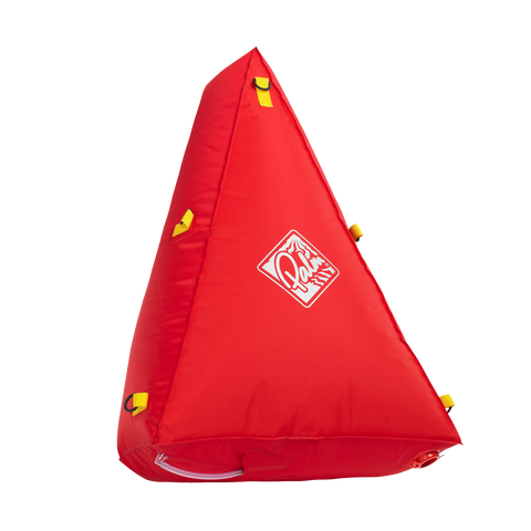 A red Palm Equipment canoe float airbag with yellow lash tabs and a white logo