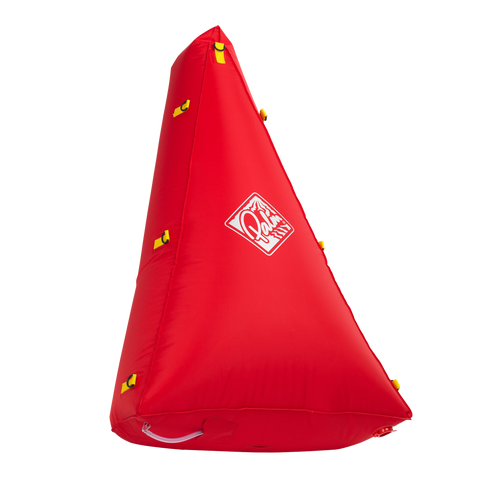 A inflated triangle shaped red canoe air bag with yellow attachment points around the edge and a Palm logo on top.