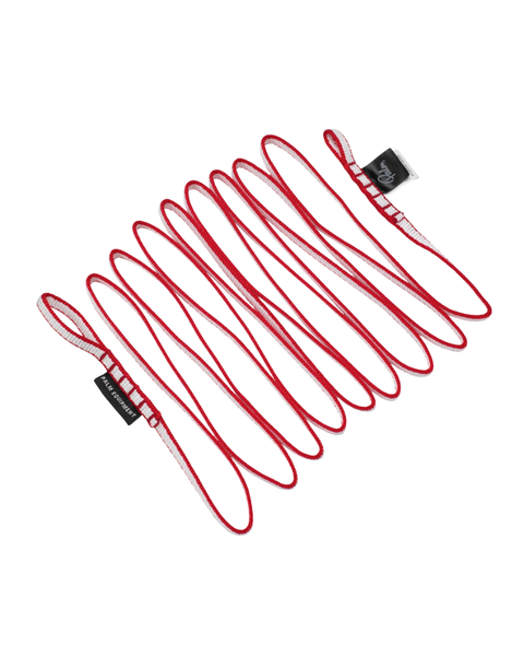 a red a white webbing sling laid in a zig zag pattern on a white background.