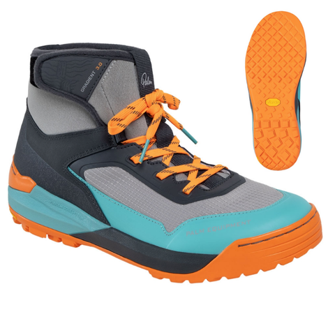 Boots with orange laces and sole on a white background