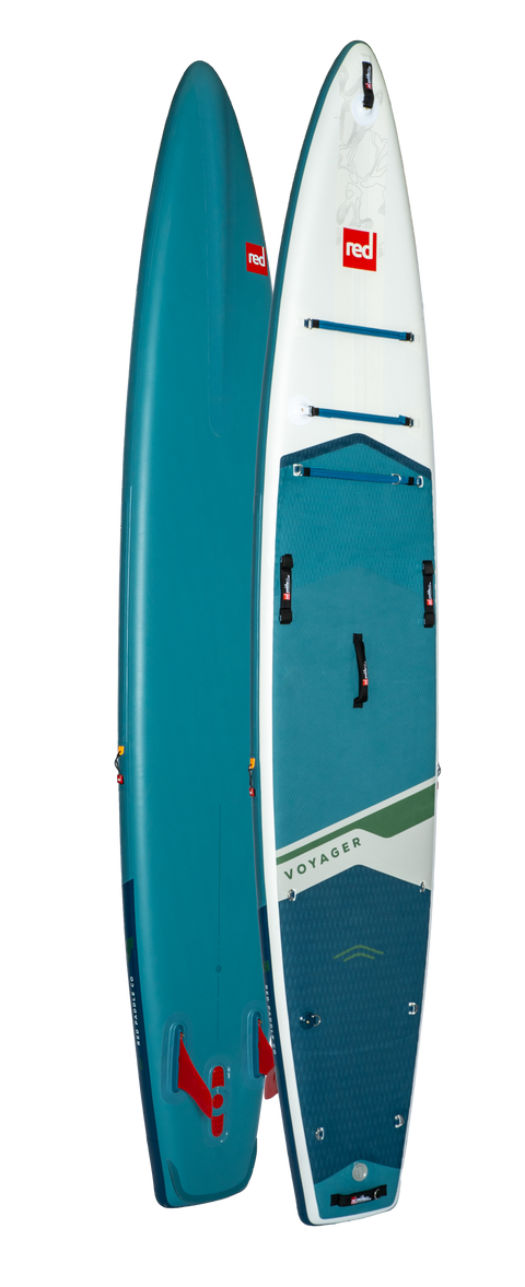 A blue and white paddleboard with green detailing. Includes black carrying handles, tie down points and fins as as well and Red brand logos