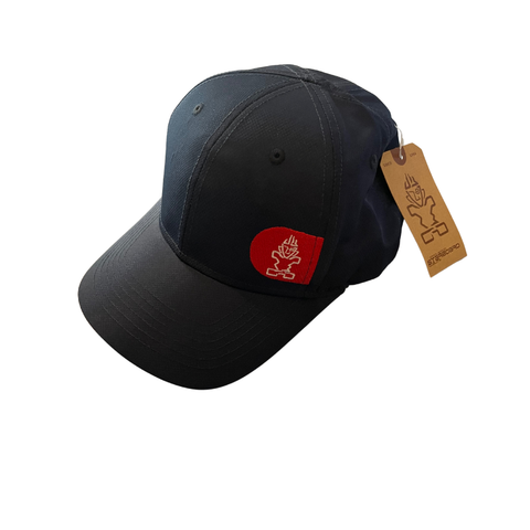 Navy blue cap with a red logo and a brown tag on a white background