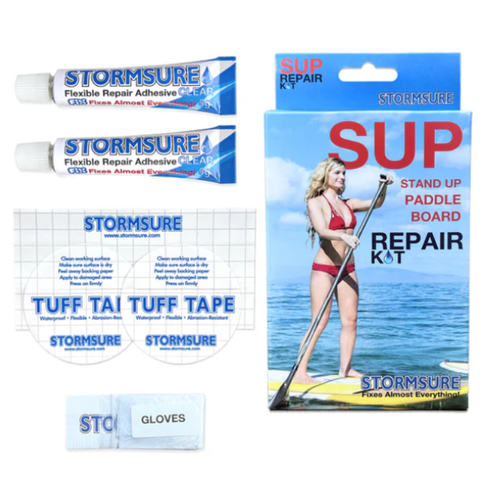 Picture of the contents of a Stormsure paddleboard repair kit includes adhesive and patches. 