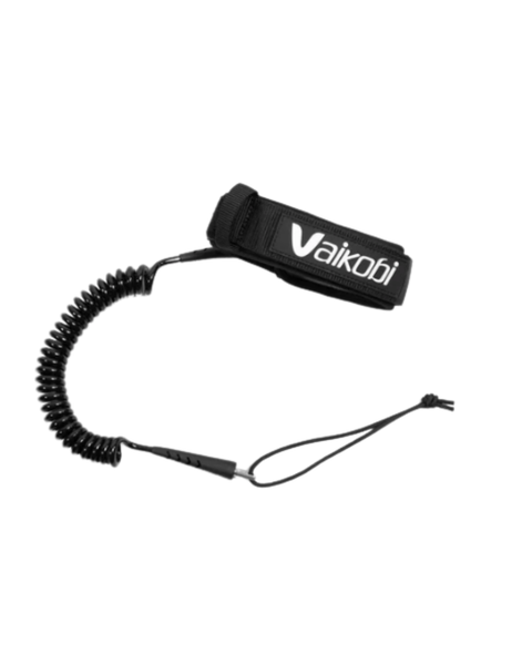 A coiled black leash with a fabric cuff and board attachment lanyard. Includes a Vaikobi logo in white letters