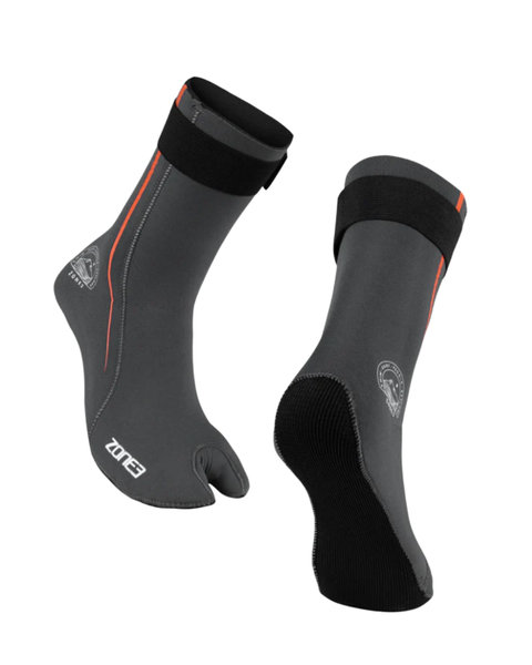 A pair of grey neoprene socks with orange detailing and white lettering on a white background.